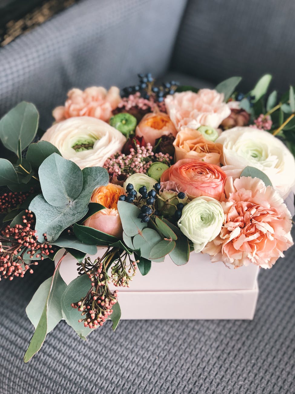 white orange and green floral bouquet decor